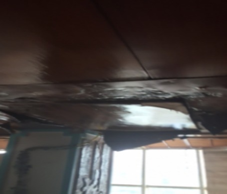 Moisture meter on wall and thermal imaging under sink